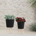 10 In. and 12 In. Black Resin Ridged Decorative Planter with Wood Legs (2-Pack)